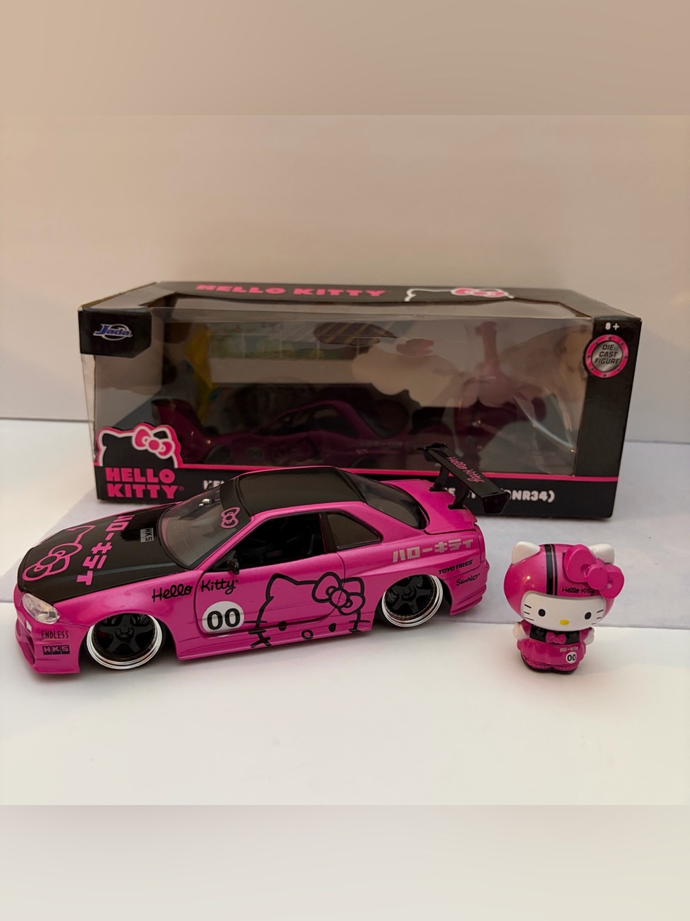 Hello Kitty Hot Pink Race Car with Black Accents